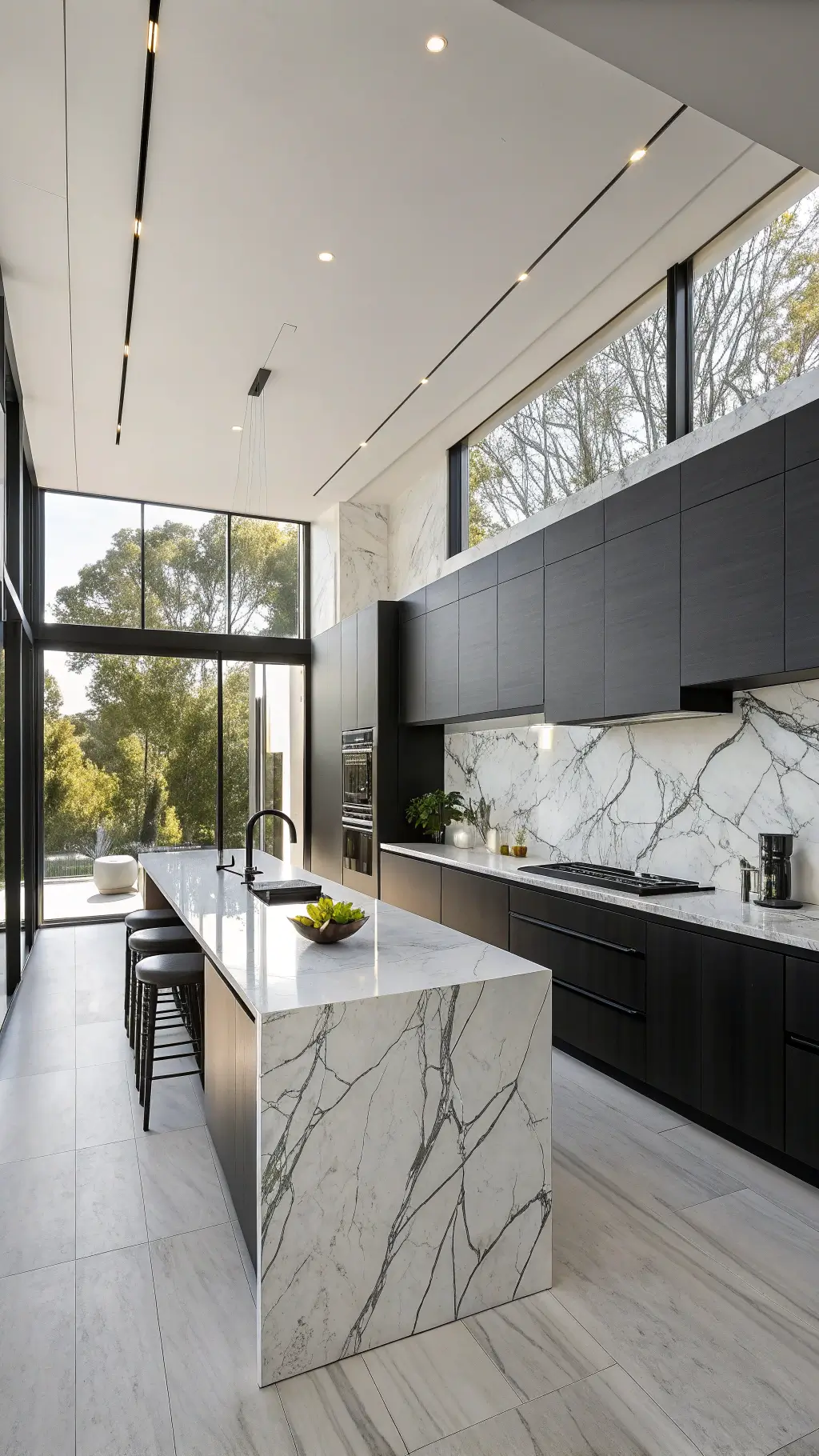 Minimalist luxury kitchen with matte black cabinets, Statuario marble backsplash, sleek island, and floor-to-ceiling windows, styled with an orchid and geometric sculptures
